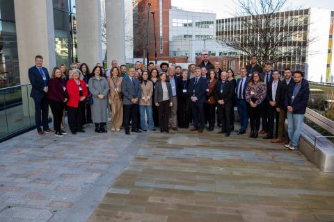 Image of members attending OSPREY kick-off event standing outside Sheffield Hallam University